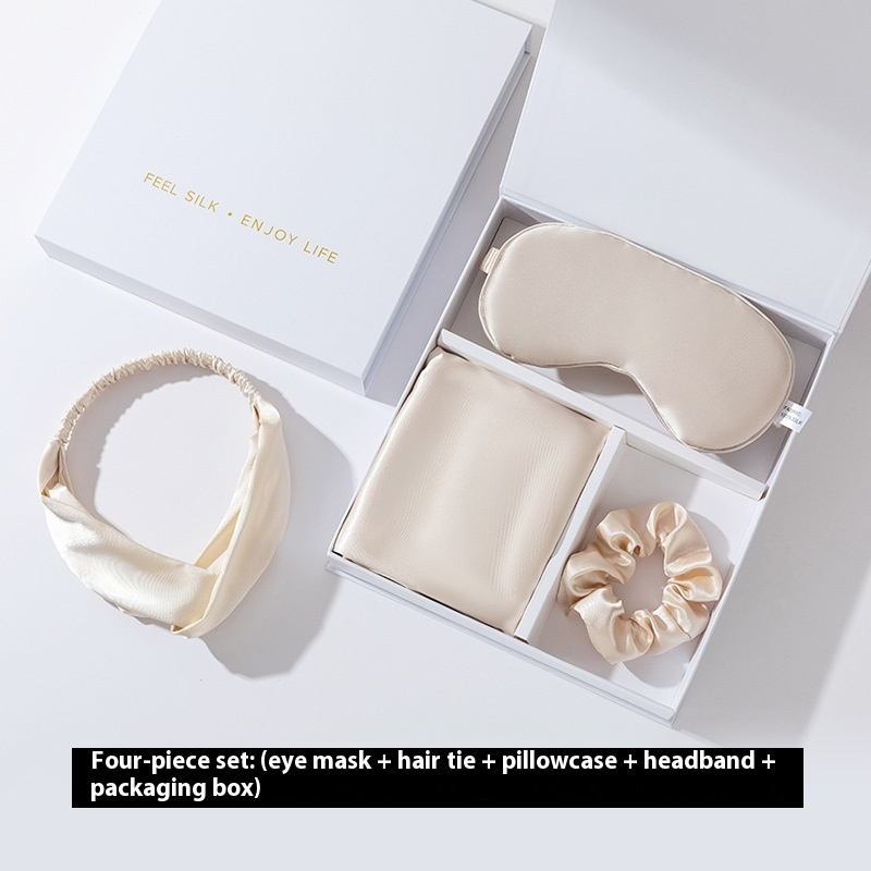 Four-piece set including an eye mask, hair tie, pillowcase, headband, and packaging box